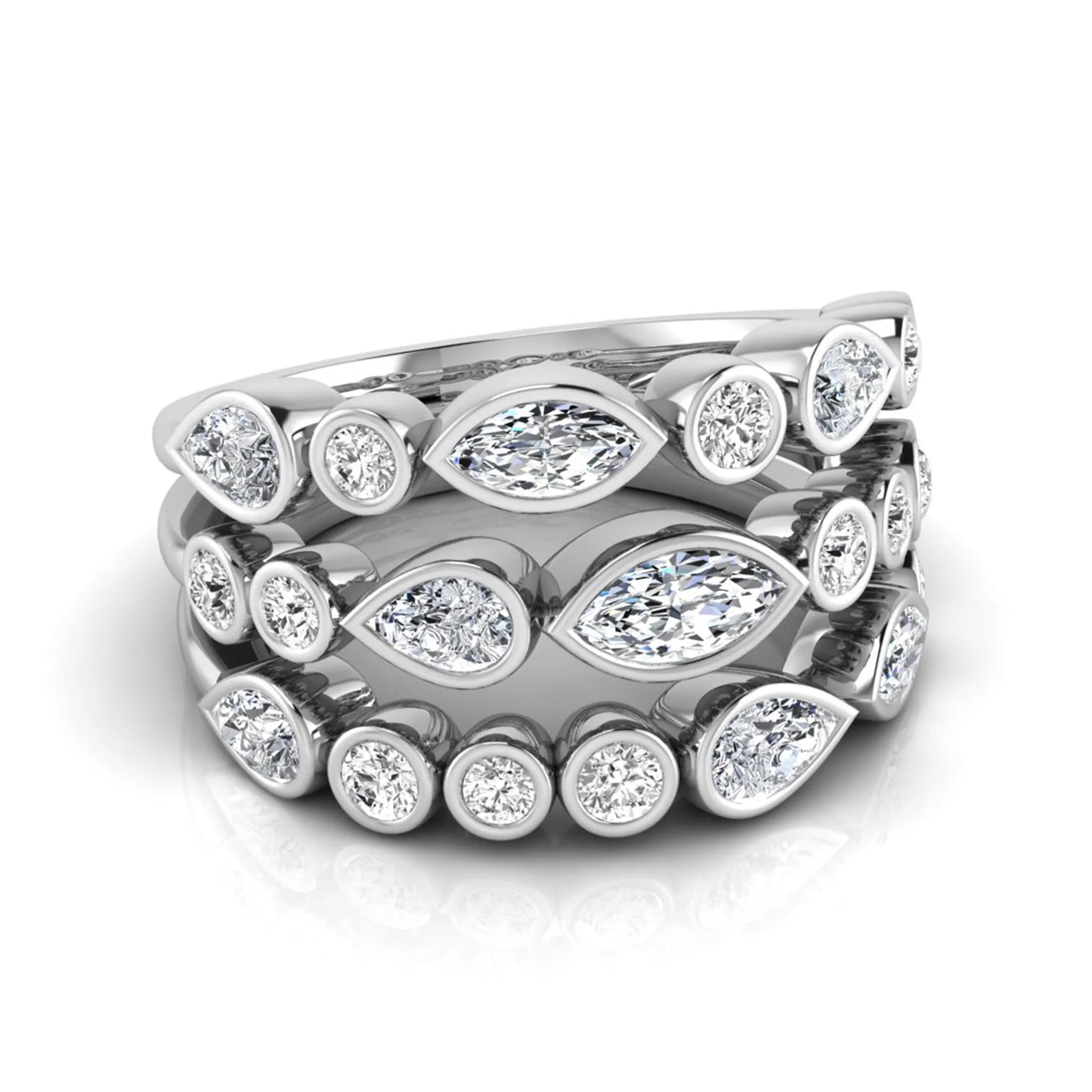 Multi shape lab grown diamond stacking ring featuring marquise, pear, and round bezel set diamonds totaling 1.50 carats in white gold.