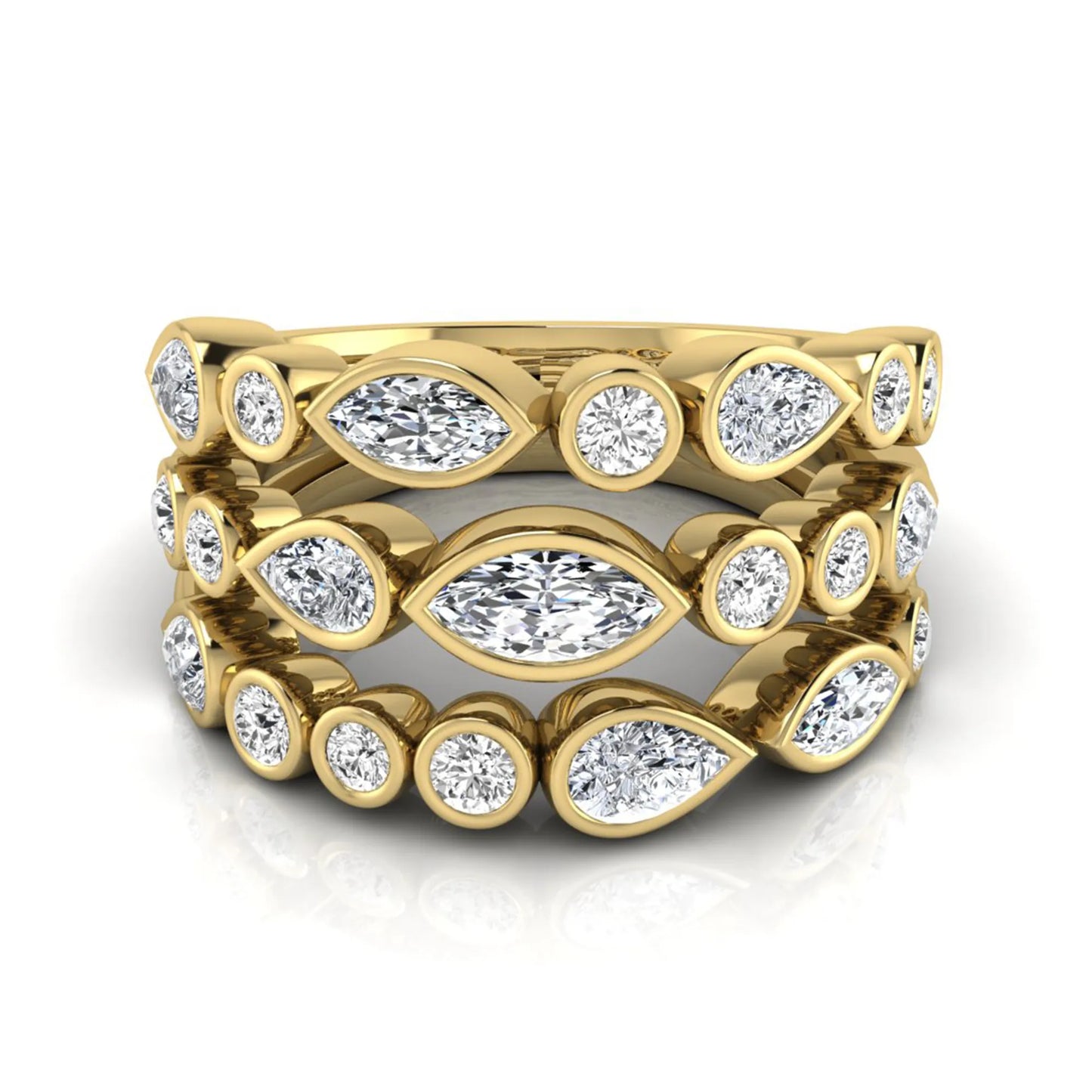 Multi shape lab grown diamond stacking ring featuring marquise, pear, and round bezel set diamonds totaling 1.50 carats in yellow gold.