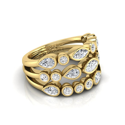 Multi shape lab grown diamond stacking ring featuring marquise, pear, and round bezel set diamonds totaling 1.50 carats in yellow gold.