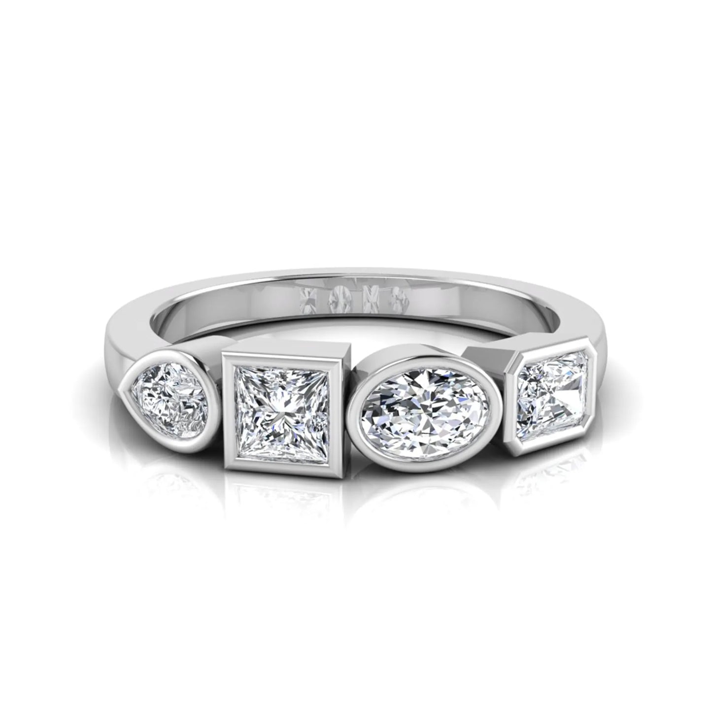 white gold Multi shape lab grown diamond statement ring featuring princess, radiant, oval and pear cut diamonds in bezel settings
