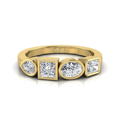 Yellow gold Multi shape lab grown diamond statement ring featuring princess, radiant, oval and pear cut diamonds in bezel settings