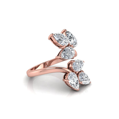 Nature Inspired Pear Cut Lab Grown Diamond Open Wrap Ring featuring pear-shaped diamonds in a prong setting with an elegant rose gold tone open wrap leaf-inspired design.