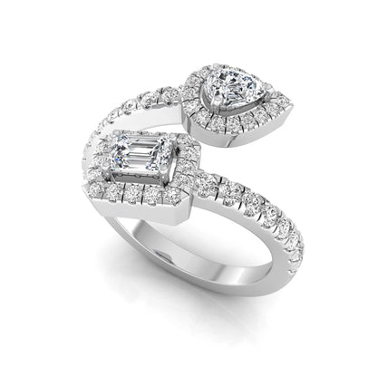white gold Open bypass lab grown diamond wrap ring featuring pear cut and emerald cut diamonds surrounded by halo accents with a pavé diamond band.
