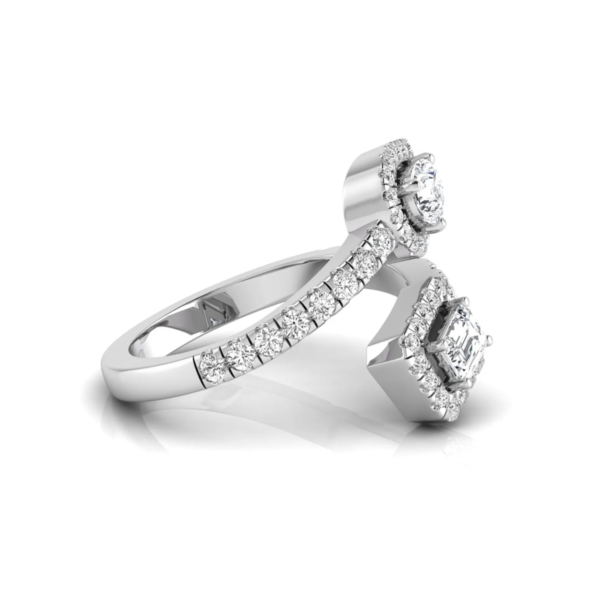 white gold Open bypass lab grown diamond wrap ring featuring pear cut and emerald cut diamonds surrounded by halo accents with a pavé diamond band.