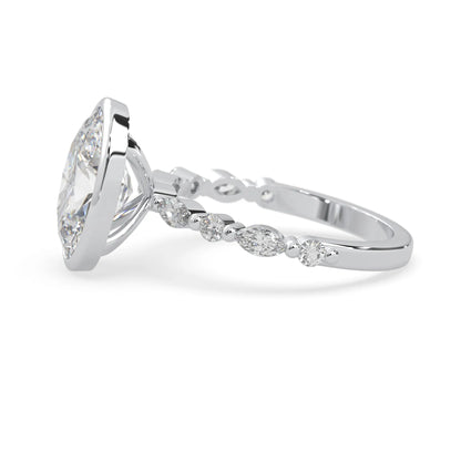 Oval bezel set lab grown diamond pave engagement ring with 3.50 carat center diamond in white gold