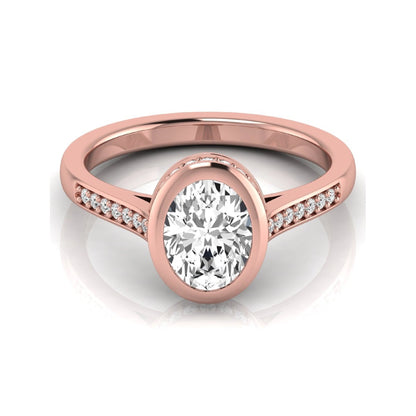 Oval cut lab grown diamond engagement ring featuring a 1.21 carat IGI certified center diamond in a modern bezel setting with pavé diamond shoulders and a polished rose gold band.
