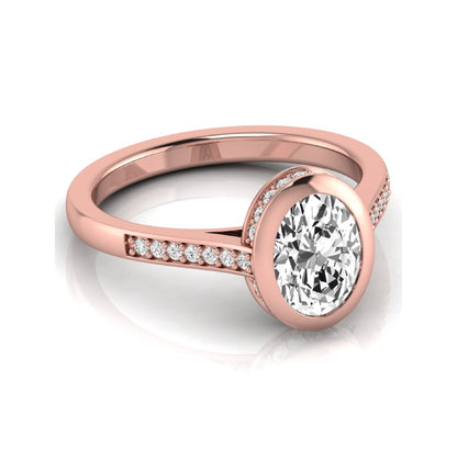 Oval cut lab grown diamond engagement ring featuring a 1.21 carat IGI certified center diamond in a modern bezel setting with pavé diamond shoulders and a polished rose gold band.