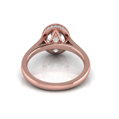 Oval cut lab grown diamond engagement ring featuring a 1.21 carat IGI certified center diamond in a modern bezel setting with pavé diamond shoulders and a polished rose gold band.
