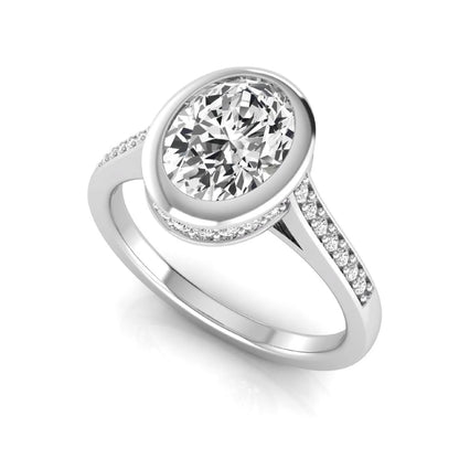 Oval cut lab grown diamond engagement ring featuring a 1.21 carat IGI certified center diamond in a modern bezel setting with pavé diamond shoulders and a polished white gold band.