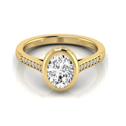 Oval cut lab grown diamond engagement ring featuring a 1.21 carat IGI certified center diamond in a modern bezel setting with pavé diamond shoulders and a polished yellow gold band.