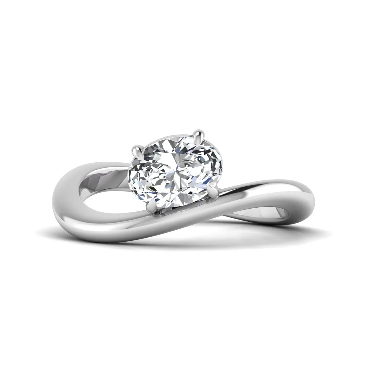 Oval cut lab grown diamond curved solitaire engagement ring with a four-prong setting in white gold