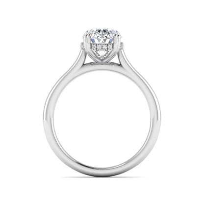 Oval cut hidden halo lab grown diamond engagement ring with double claw prongs in white gold.