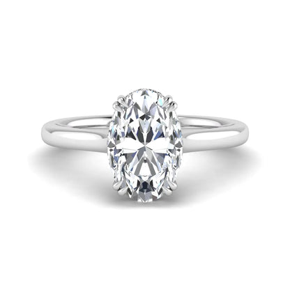 Oval cut hidden halo lab grown diamond engagement ring with double claw prongs in white gold.
