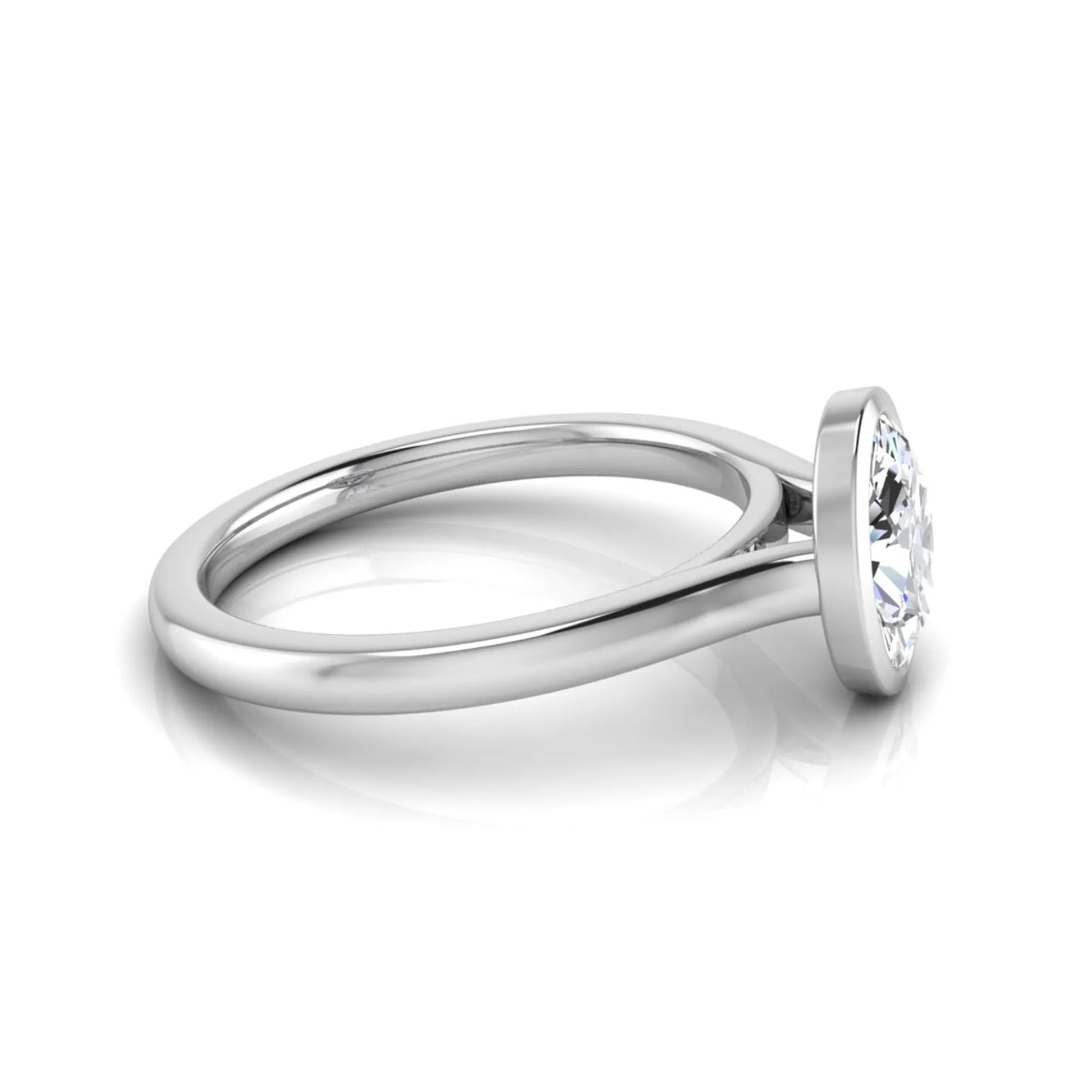 Oval cut lab grown diamond bezel solitaire engagement ring featuring a 0.75 carat center diamond in polished white gold.