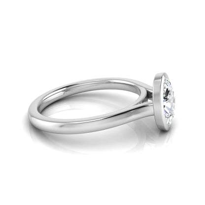 Oval cut lab grown diamond bezel solitaire engagement ring featuring a 0.75 carat center diamond in polished white gold.