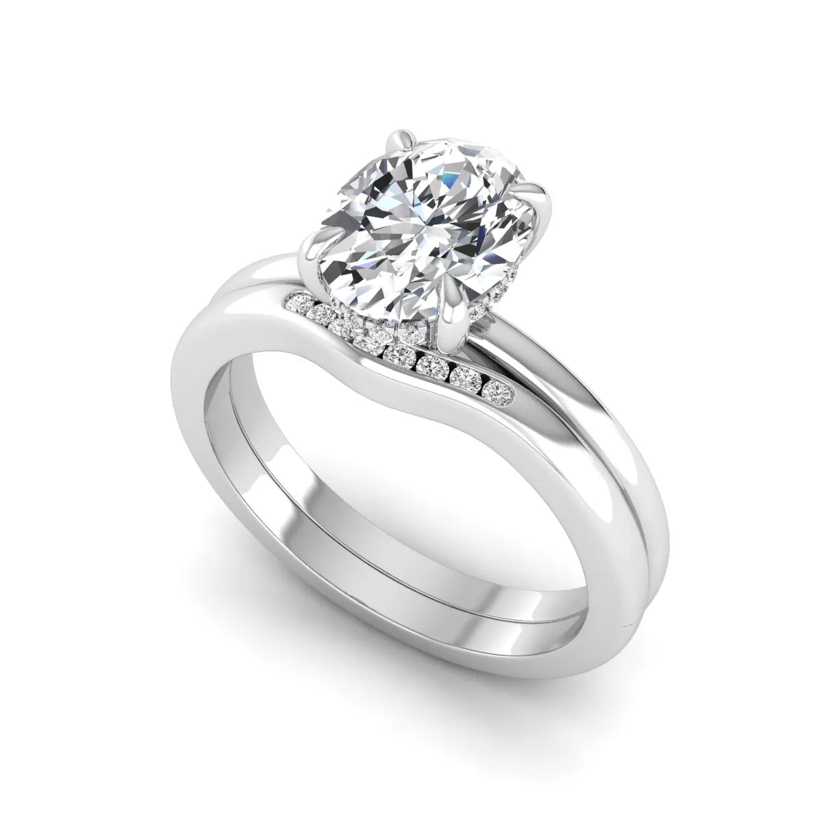 IGI certified oval cut lab grown diamond bridal ring set featuring a hidden halo engagement ring with a matching curved diamond wedding band in white gold.