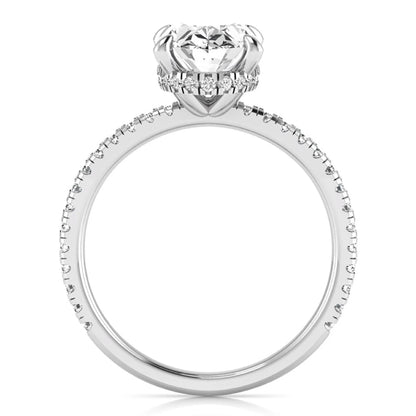 Oval cut lab grown diamond engagement ring featuring a 2.30 carat IGI certified center diamond with hidden halo and pavé round side diamonds in white gold.