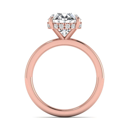 IGI certified oval cut lab grown diamond hidden halo solitaire engagement ring in rose gold.