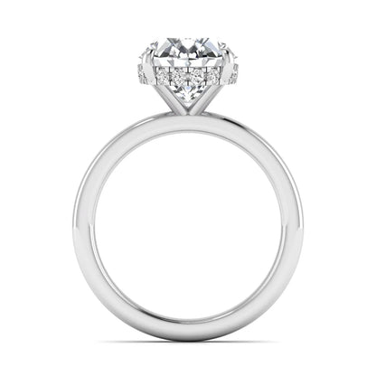 IGI certified oval cut lab grown diamond hidden halo solitaire engagement ring in white gold.