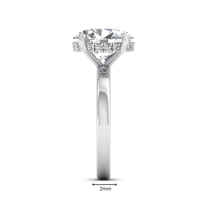 IGI certified oval cut lab grown diamond hidden halo solitaire engagement ring in white gold.