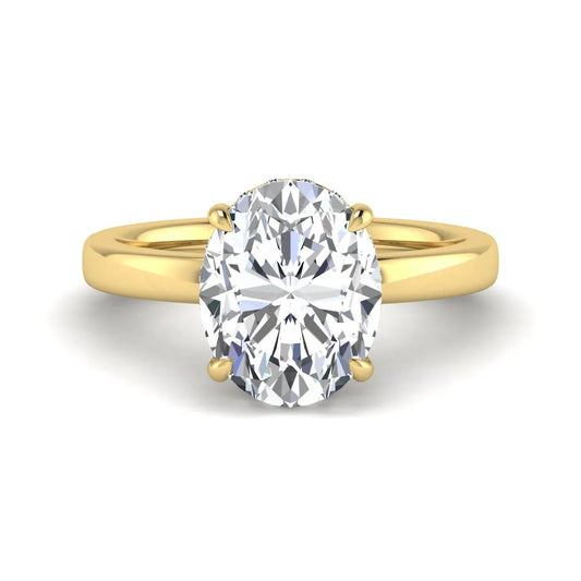 IGI certified oval cut lab grown diamond hidden halo solitaire engagement ring in yellow gold.