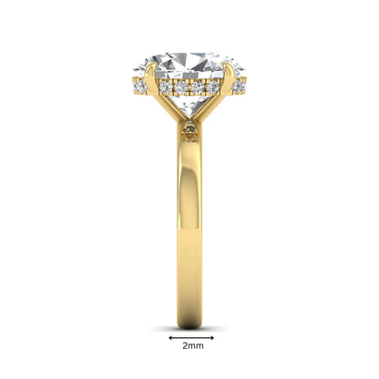 IGI certified oval cut lab grown diamond hidden halo solitaire engagement ring in yellow gold.