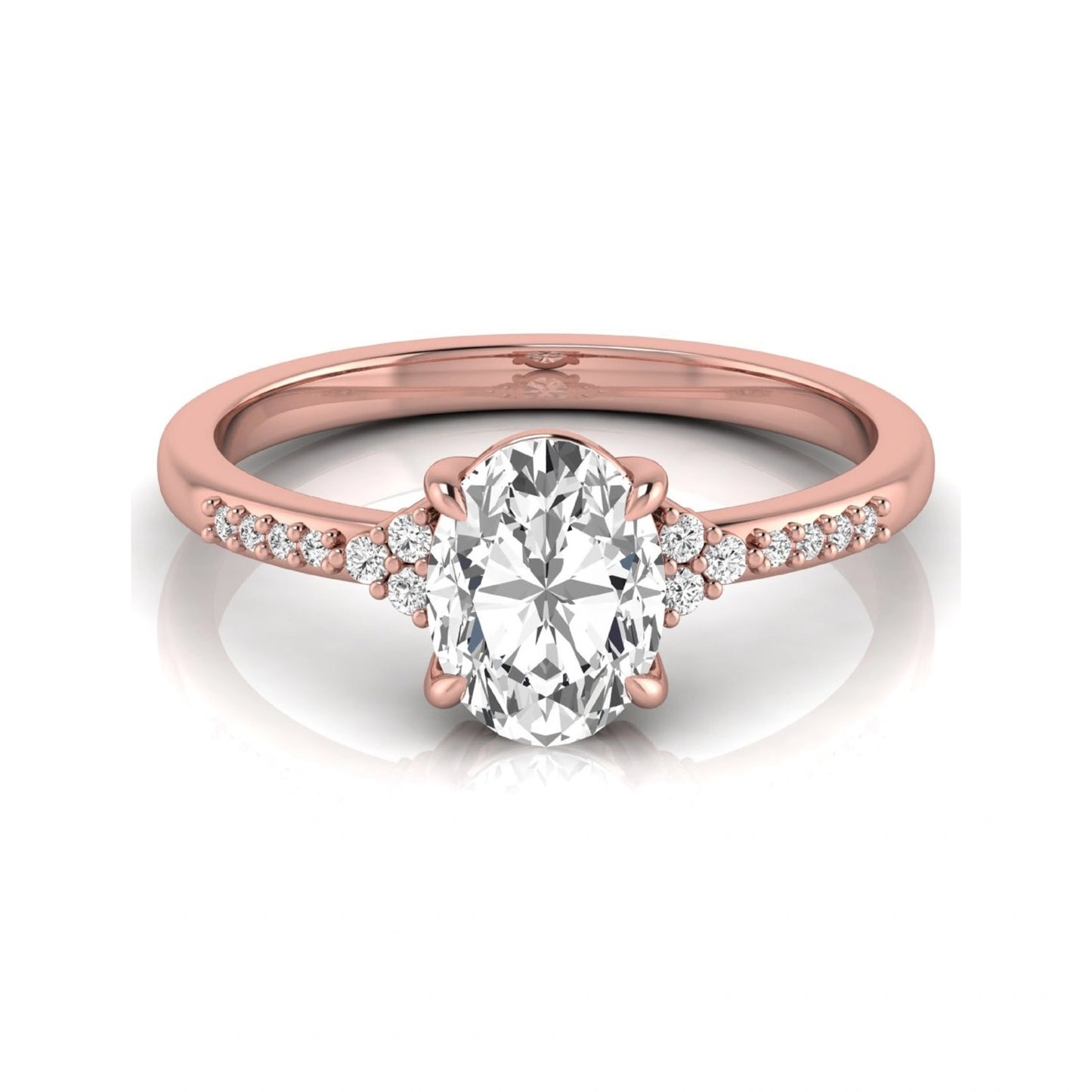 Oval cut lab grown diamond side stone engagement ring featuring a 1.40 carat IGI certified center diamond with round accent diamonds in rose gold.