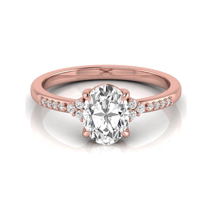 Oval cut lab grown diamond side stone engagement ring featuring a 1.40 carat IGI certified center diamond with round accent diamonds in rose gold.