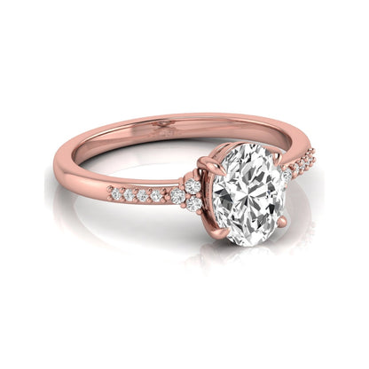 Oval cut lab grown diamond side stone engagement ring featuring a 1.40 carat IGI certified center diamond with round accent diamonds in rose gold.