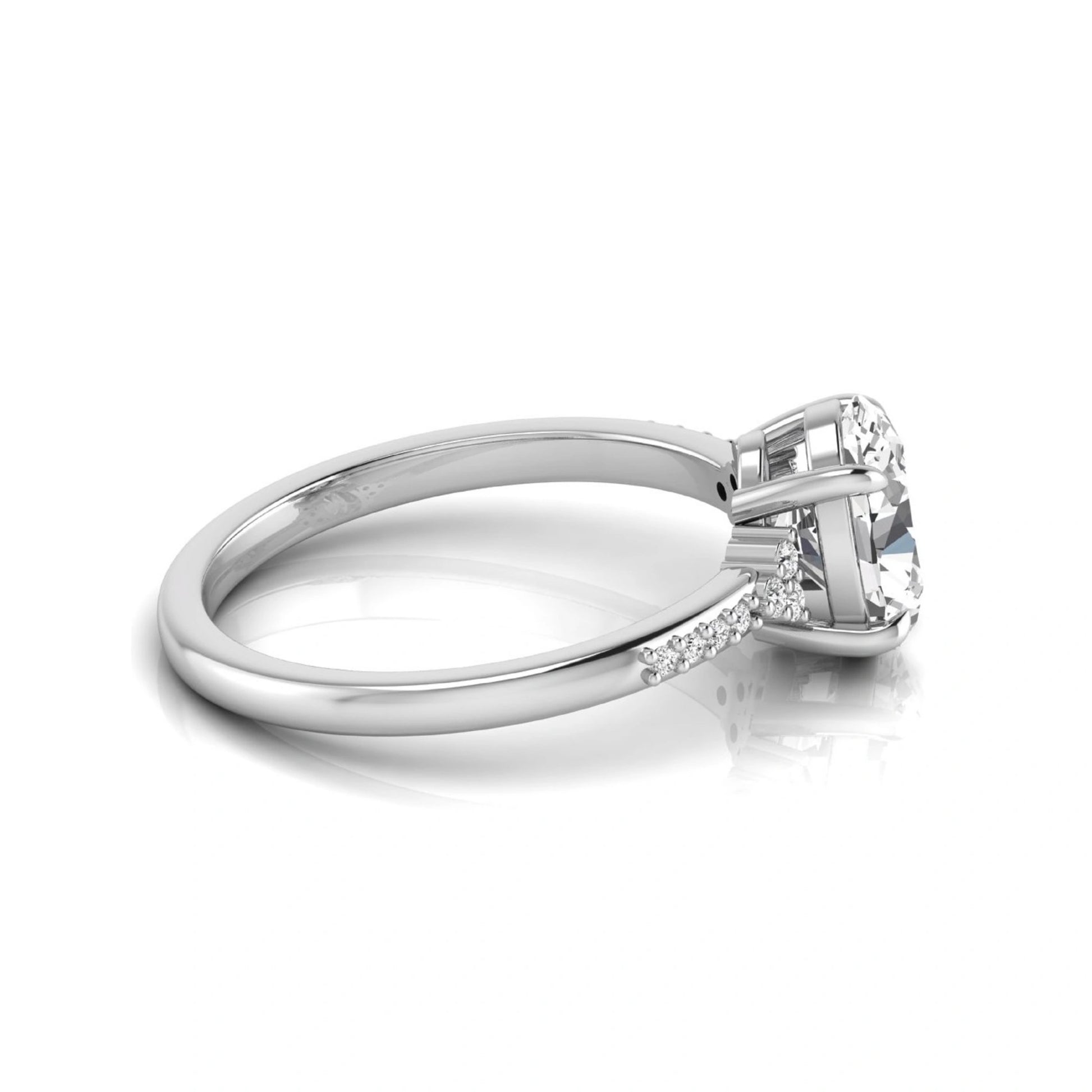 Oval cut lab grown diamond side stone engagement ring featuring a 1.40 carat IGI certified center diamond with round accent diamonds in white gold.