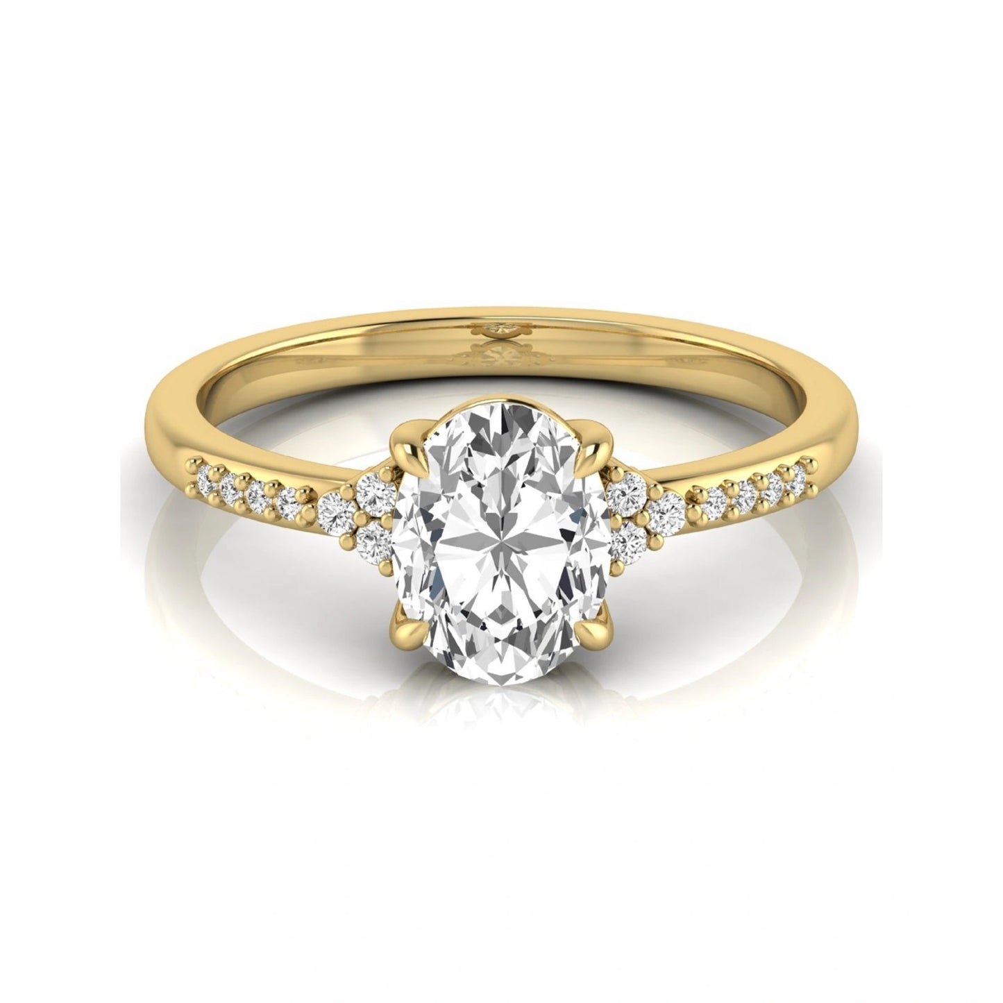 Oval cut lab grown diamond side stone engagement ring featuring a 1.40 carat IGI certified center diamond with round accent diamonds in yellow gold.