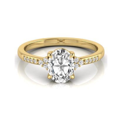 Oval cut lab grown diamond side stone engagement ring featuring a 1.40 carat IGI certified center diamond with round accent diamonds in yellow gold.