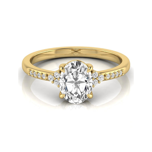 Oval cut lab grown diamond side stone engagement ring featuring a 1.40 carat IGI certified center diamond with round accent diamonds in yellow gold.