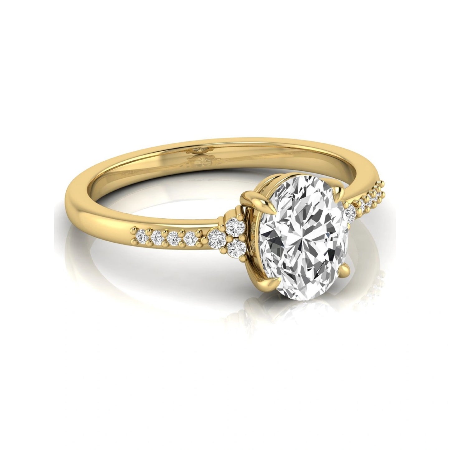 Oval cut lab grown diamond side stone engagement ring featuring a 1.40 carat IGI certified center diamond with round accent diamonds in yellow gold.