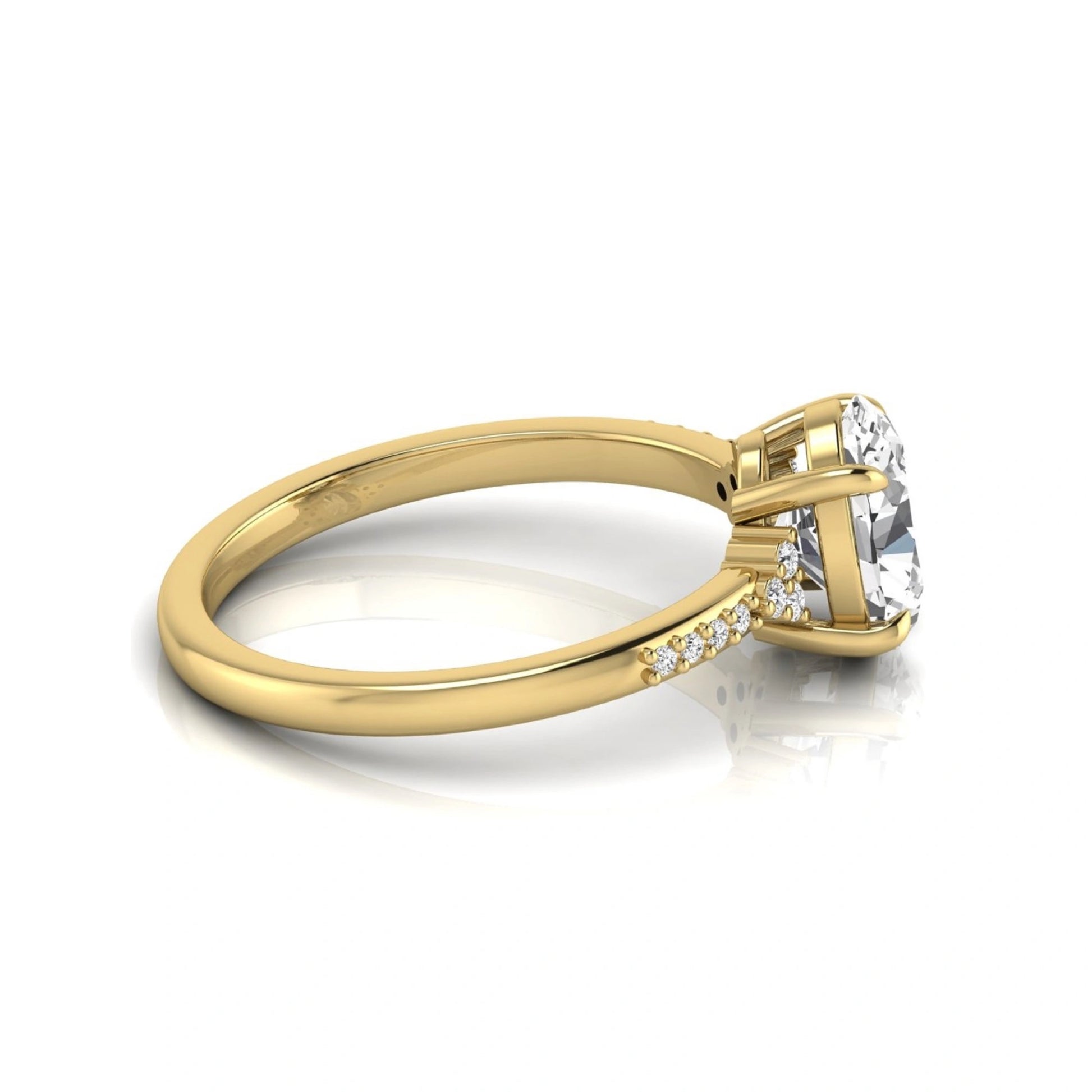 Oval cut lab grown diamond side stone engagement ring featuring a 1.40 carat IGI certified center diamond with round accent diamonds in yellow gold.