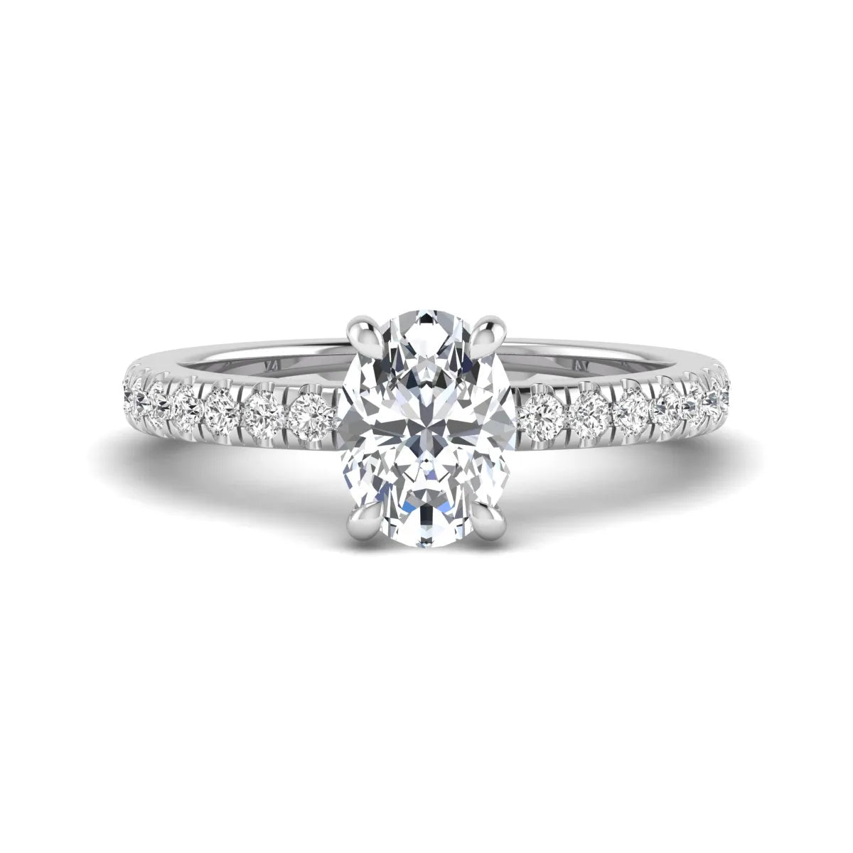 IGI certified oval cut lab grown diamond solitaire accent engagement ring with pavé round diamond band in white gold.