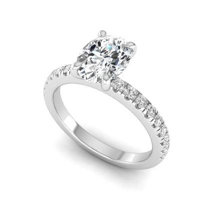 IGI certified oval cut lab grown diamond solitaire accent engagement ring with pavé round diamond band in white gold.