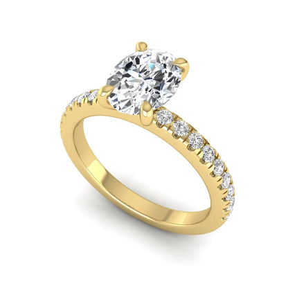 IGI certified oval cut lab grown diamond solitaire accent engagement ring with pavé round diamond band in yellow gold.
