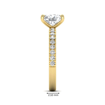 IGI certified oval cut lab grown diamond solitaire accent engagement ring with pavé round diamond band in yellow gold.