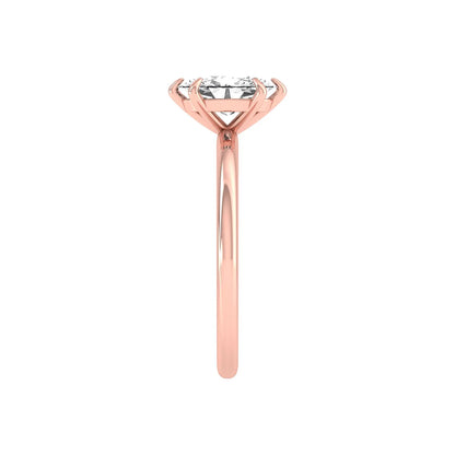 Oval cut lab grown diamond solitaire engagement ring featuring a 1.15 carat IGI certified center diamond in a classic six-prong setting in rose gold