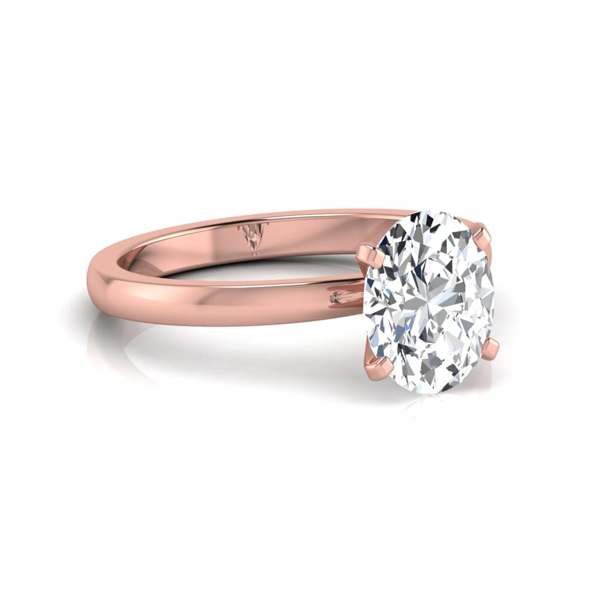 Oval cut lab grown diamond solitaire engagement ring featuring a four-prong setting with a rose gold tone band.