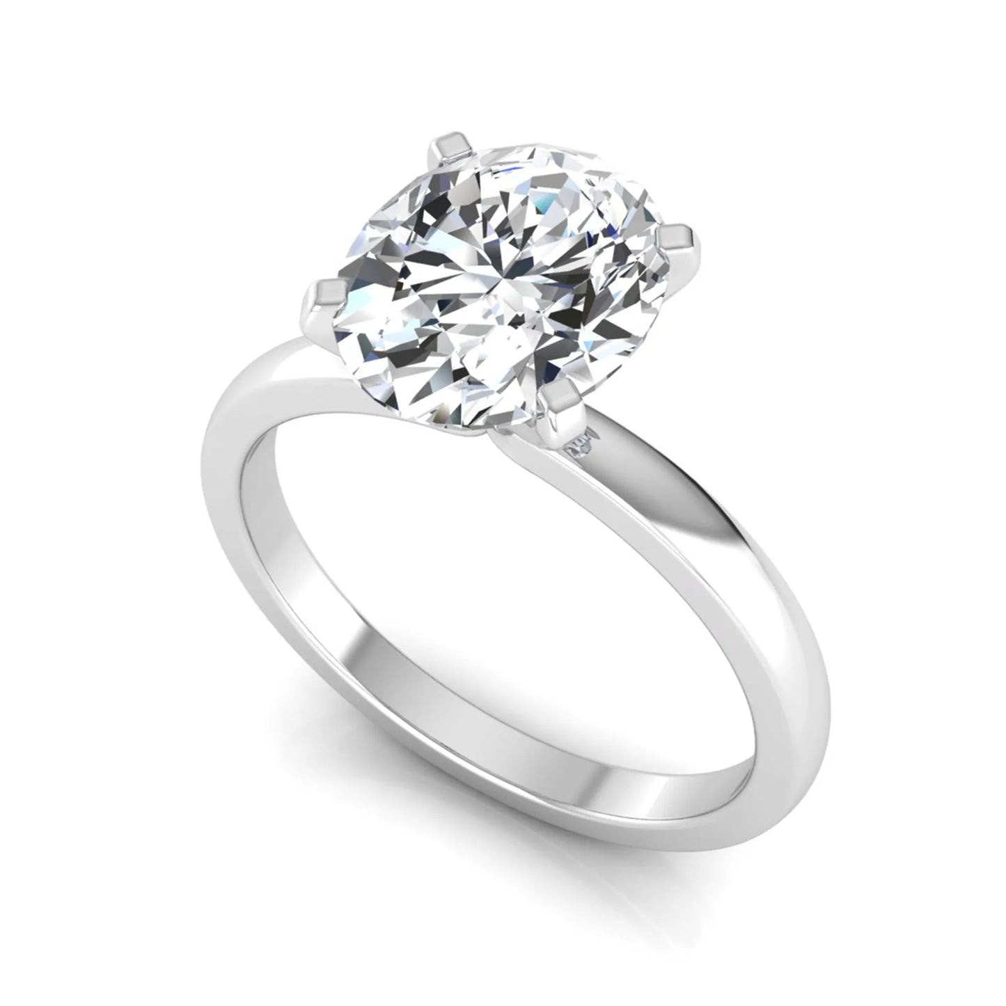 Oval cut lab grown diamond solitaire engagement ring featuring a four-prong setting with a white gold tone band.