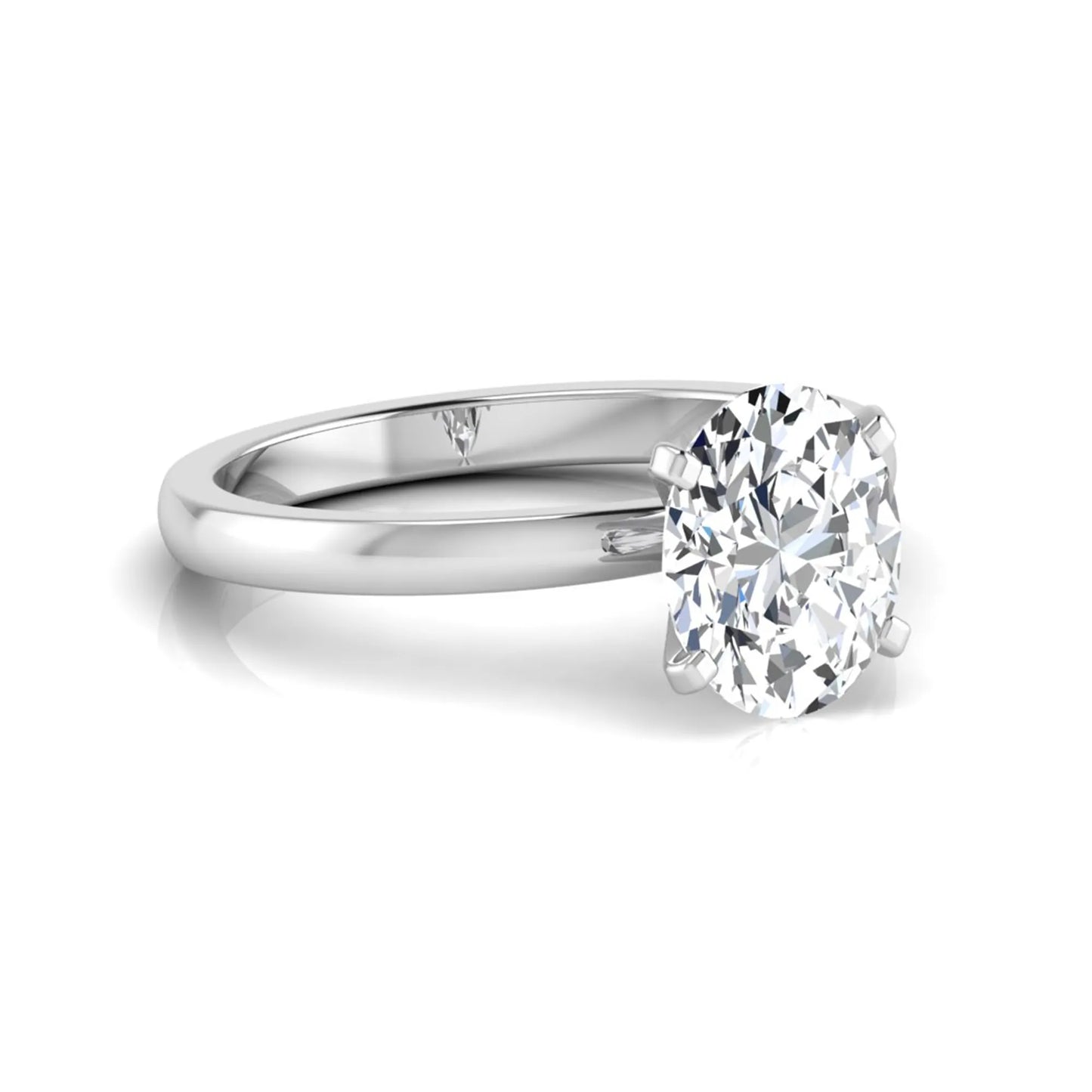 Oval cut lab grown diamond solitaire engagement ring featuring a four-prong setting with a white gold tone band.