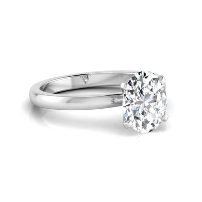 Oval cut lab grown diamond solitaire engagement ring featuring a four-prong setting with a white gold tone band.