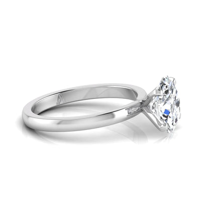 Oval cut lab grown diamond solitaire engagement ring featuring a four-prong setting with a white gold tone band.