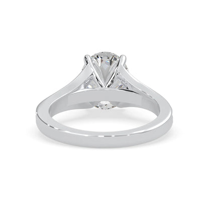 Oval cut lab grown diamond split shank engagement ring with diamond accented band in white gold