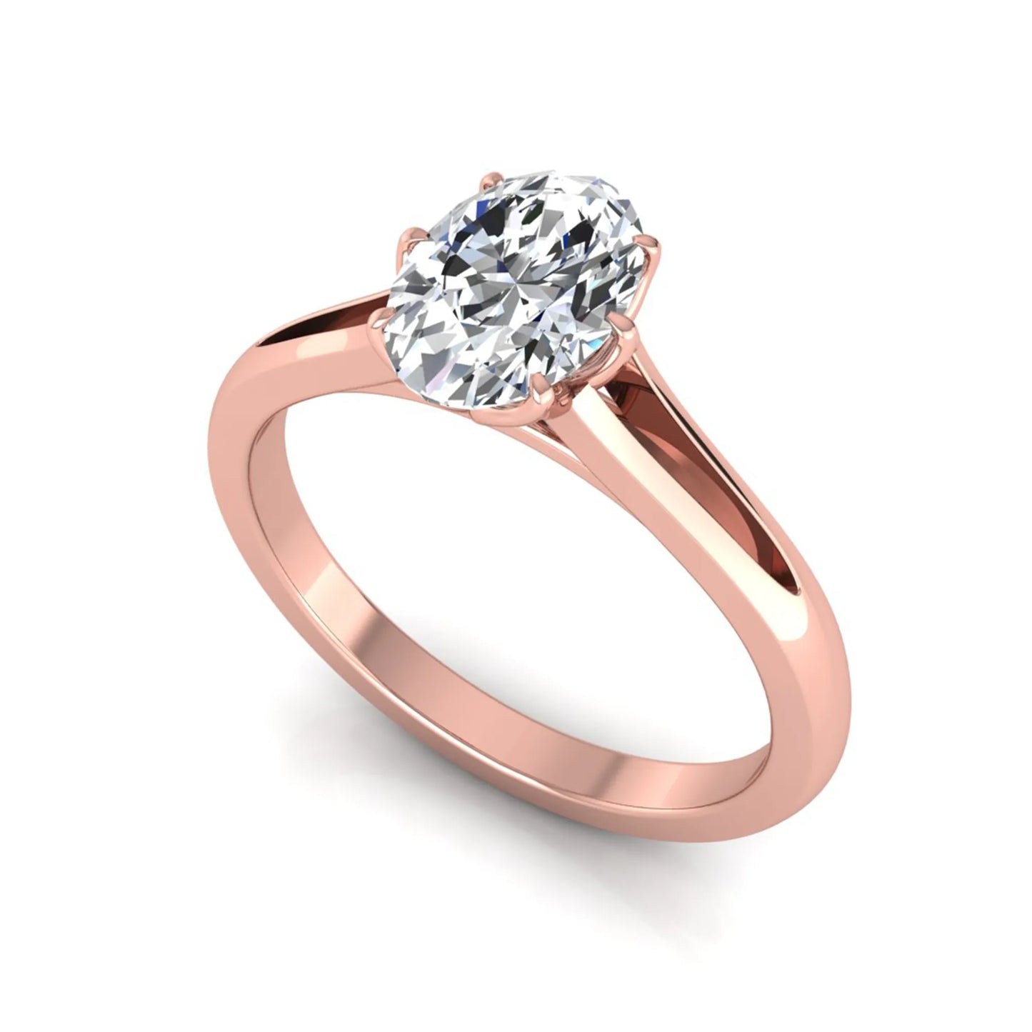 Oval cut lab grown diamond solitaire engagement ring featuring a four-prong setting and elegant split shank band in rose gold tone.
