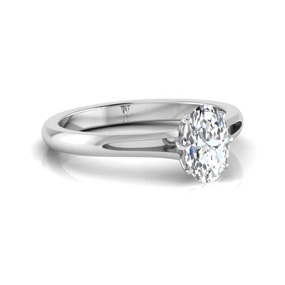 Oval cut lab grown diamond solitaire engagement ring featuring a four-prong setting and elegant split shank band in white gold tone.