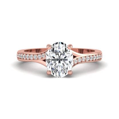 Oval cut lab grown diamond split shank pavé engagement ring with four-prong setting and rose gold tone band.