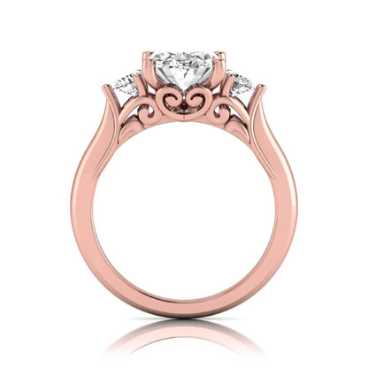 Oval cut lab grown diamond three stone engagement ring featuring a 1.86 carat IGI certified center diamond with round side diamonds in yellow gold.